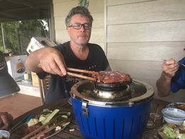 Cooking protein over an asian Fondue, on LotusGrill Fondue Set